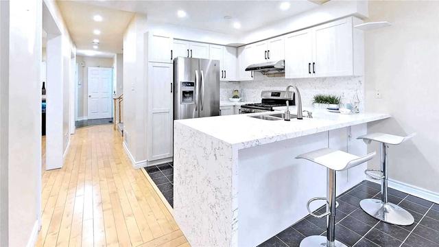2 Magnum Way, House detached with 4 bedrooms, 4 bathrooms and 4 parking in Toronto ON | Image 3