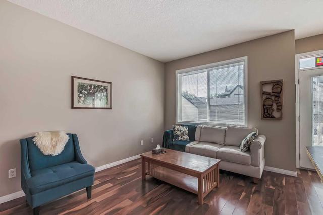 10 Everridge Gardens Sw, Home with 2 bedrooms, 2 bathrooms and 2 parking in Calgary AB | Image 12