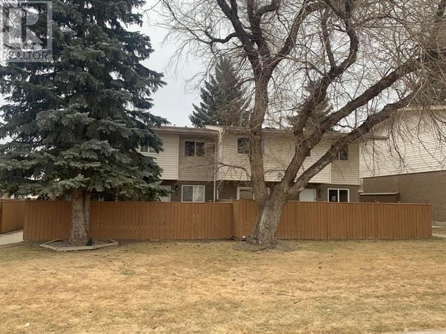 11, - 1915 18 Avenue N, House attached with 3 bedrooms, 1 bathrooms and 1 parking in Lethbridge AB | Card Image