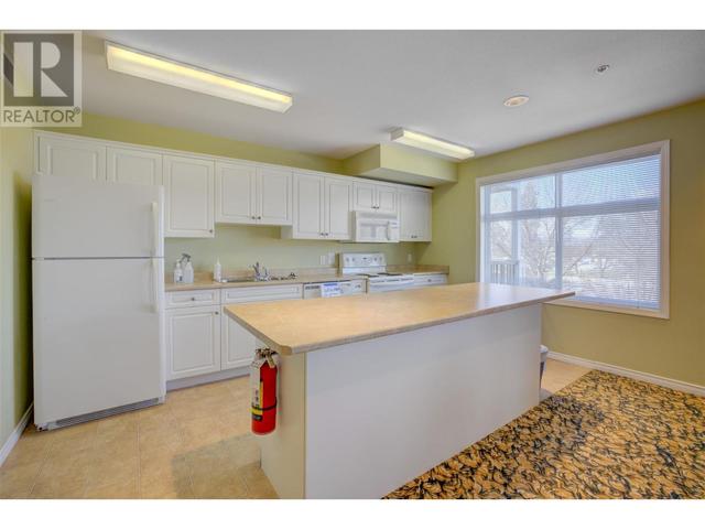 106 - 1235 Klo Road, Condo with 2 bedrooms, 2 bathrooms and 1 parking in Kelowna BC | Image 37