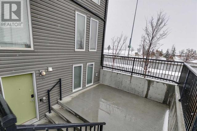 215, - 338 Seton Circle Se, House attached with 2 bedrooms, 1 bathrooms and 1 parking in Calgary AB | Image 17