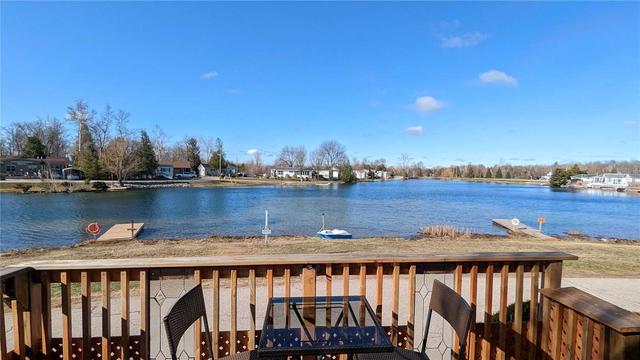 27 Trillium Beach Dr, Condo with 2 bedrooms, 1 bathrooms and 3 parking in Puslinch ON | Image 1