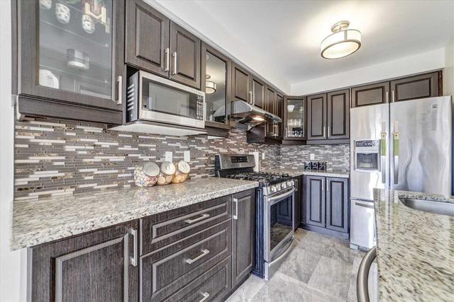 9 Rivitt Pl, House attached with 3 bedrooms, 3 bathrooms and 4 parking in Toronto ON | Image 2