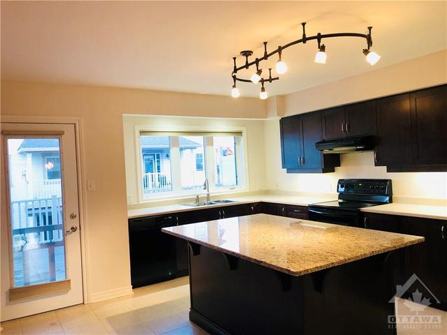 404 Santa Anna Lane, Townhouse with 4 bedrooms, 4 bathrooms and 2 parking in Ottawa ON | Image 14
