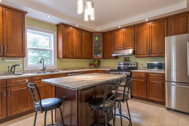 879 Highway 7, House detached with 4 bedrooms, 2 bathrooms and 5 parking in Otonabee South Monaghan ON | Image 36