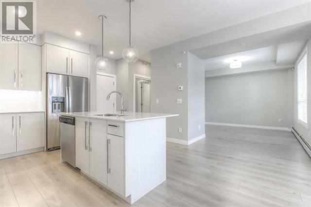303, - 383 Smith Street Nw, Condo with 1 bedrooms, 2 bathrooms and 1 parking in Calgary AB | Image 4