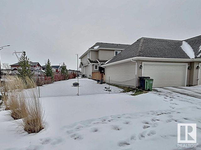 2146 Trumpeter Wy Nw, House attached with 3 bedrooms, 2 bathrooms and 4 parking in Edmonton AB | Card Image