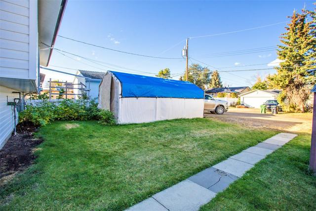 6210a 48a Avenue, Home with 4 bedrooms, 2 bathrooms and 1 parking in Camrose County AB | Image 23