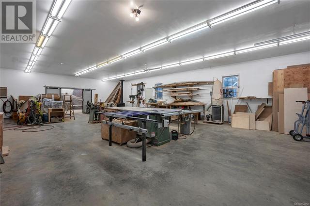Workshop 30’ Wide x 70’ Long – 10’ Height •Fully Finished inside with 4 inch Concrete Slab Floor •Pro Lock Metal Roof  & Leaf Guard Gutters in Sept 2020 •WETT Certified Woodstove (Nov 2020) and | Image 83