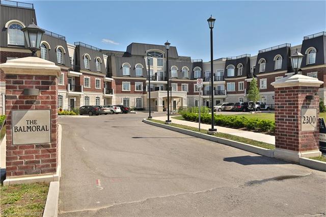 306 - 2300 Upper Middle Road, House attached with 1 bedrooms, 1 bathrooms and 1 parking in Oakville ON | Image 1
