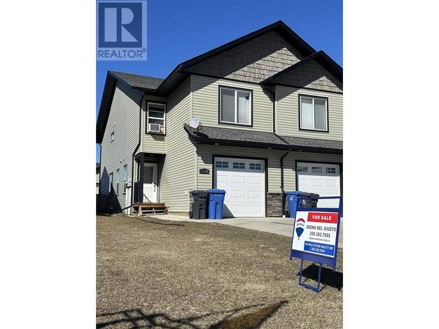 11724 102 Street, House attached with 3 bedrooms, 3 bathrooms and null parking in Fort St. John BC | Image 1