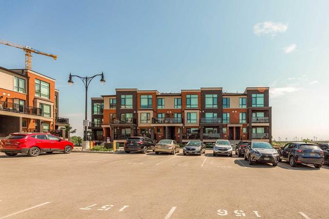 124 - 100 Dufay Rd, Townhouse with 2 bedrooms, 2 bathrooms and 2 parking in Brampton ON | Image 1