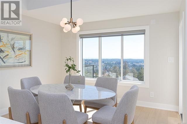 Dining with views! Photo of staged show home of similar plan, not exact unit. | Image 11