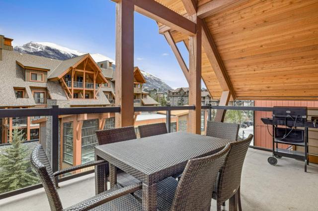 401 - 191 Kananaskis Way, Condo with 2 bedrooms, 2 bathrooms and 1 parking in Canmore AB | Image 4