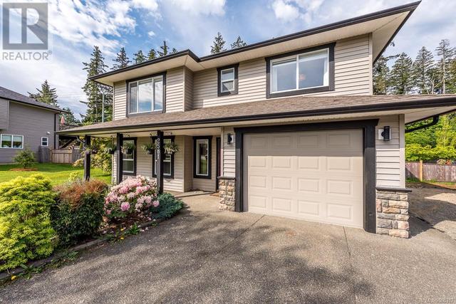 2581 Carstairs Dr, House detached with 5 bedrooms, 3 bathrooms and 1 parking in Courtenay BC | Image 1