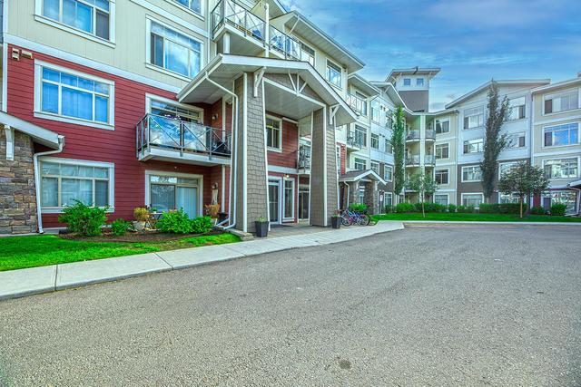 106 - 16 Auburn Bay Link Se, Condo with 2 bedrooms, 2 bathrooms and 1 parking in Calgary AB | Image 2