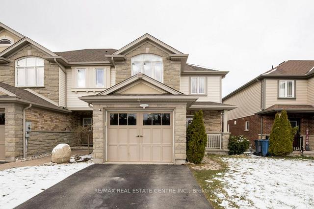 32 Wilkie Cres, House attached with 3 bedrooms, 4 bathrooms and 2 parking in Guelph ON | Image 1