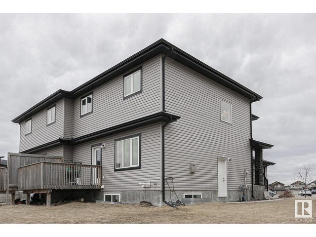13028 166 Av Nw Nw, House semidetached with 4 bedrooms, 3 bathrooms and null parking in Edmonton AB | Image 52