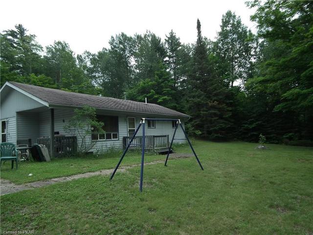 504 Mckenzie Lake Road, House detached with 3 bedrooms, 1 bathrooms and 5 parking in South Algonquin ON | Image 3