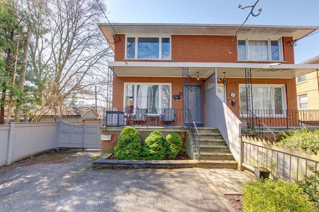 14 Louisa St, House semidetached with 3 bedrooms, 3 bathrooms and 3 parking in Toronto ON | Image 1
