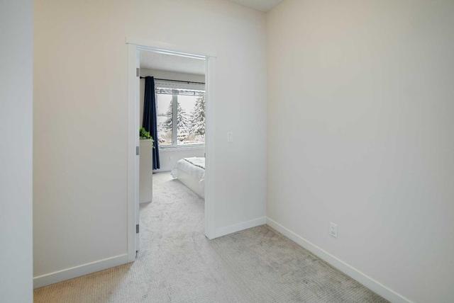 129 Shawnee Common Sw, Home with 3 bedrooms, 2 bathrooms and 2 parking in Calgary AB | Image 21