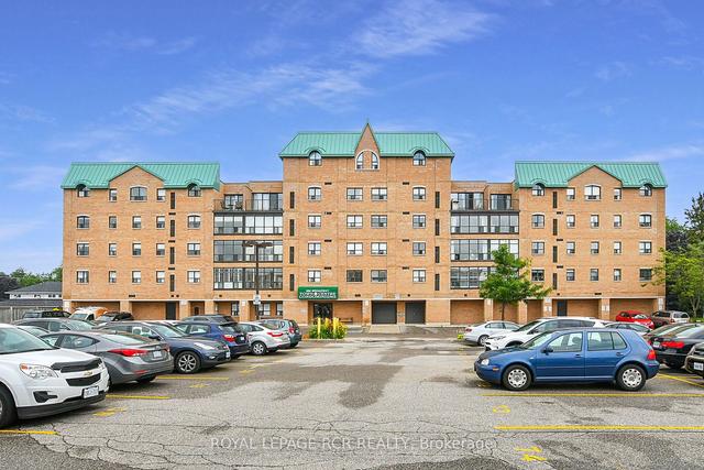 406 - 200 Broadway, Condo with 2 bedrooms, 2 bathrooms and 1 parking in Orangeville ON | Image 1