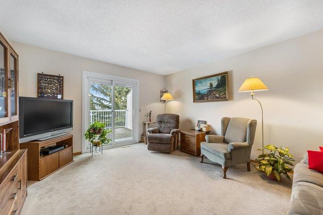 32 Macewan Park Heights Nw, Home with 3 bedrooms, 2 bathrooms and 4 parking in Calgary AB | Image 7