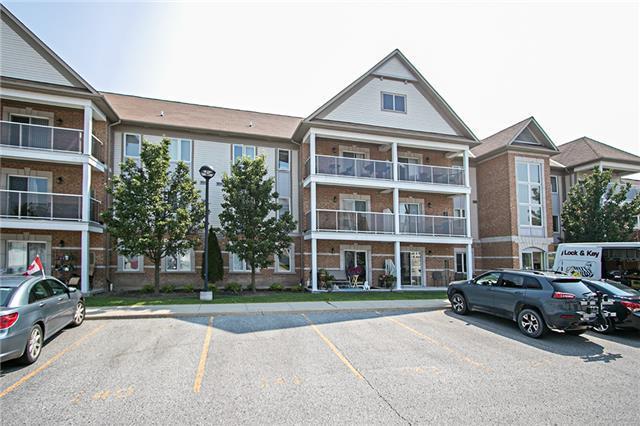 311 - 124 Aspen Springs Dr, Condo with 2 bedrooms, 1 bathrooms and 1 parking in Clarington ON | Image 1