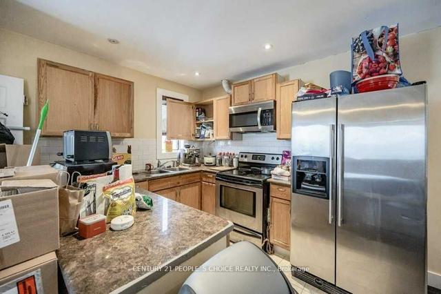 2453 St Clair Ave W, House detached with 5 bedrooms, 5 bathrooms and 6 parking in Toronto ON | Image 27