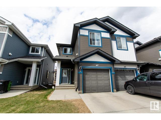 56 - 8209 217 St Nw, House attached with 3 bedrooms, 2 bathrooms and null parking in Edmonton AB | Image 1
