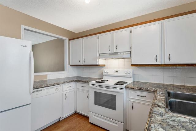 120 Whitehill Place Ne, Home with 3 bedrooms, 2 bathrooms and 2 parking in Calgary AB | Image 3