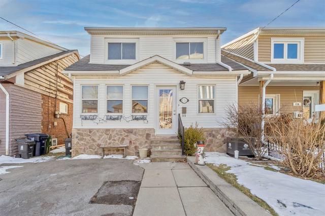 134 Twenty Second St, House detached with 2 bedrooms, 1 bathrooms and 2 parking in Toronto ON | Image 1