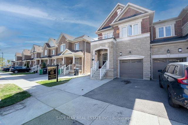 486 Queen Mary Dr, House attached with 4 bedrooms, 4 bathrooms and 4 parking in Brampton ON | Image 1