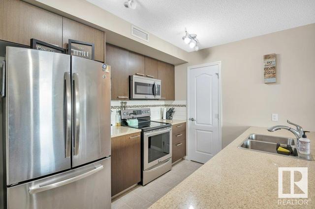 2303 - 7343 South Terwillegar Dr Nw, Condo with 2 bedrooms, 2 bathrooms and null parking in Edmonton AB | Card Image