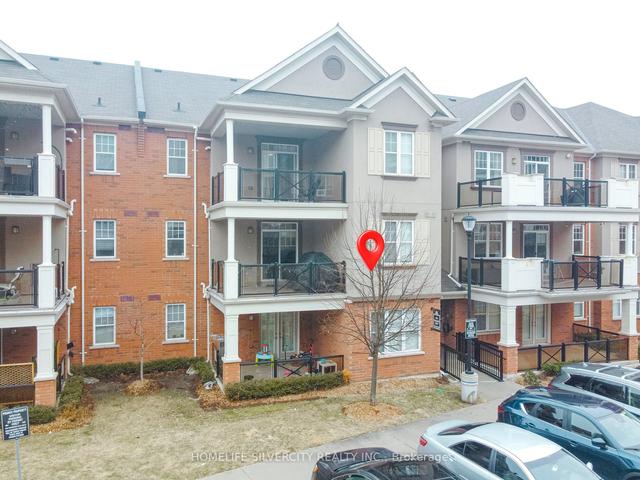 208 - 269 Georgian Dr, Townhouse with 2 bedrooms, 2 bathrooms and 2 parking in Oakville ON | Image 1