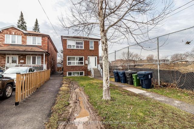 11 Dennis Ave, House detached with 4 bedrooms, 3 bathrooms and 2 parking in Toronto ON | Image 12