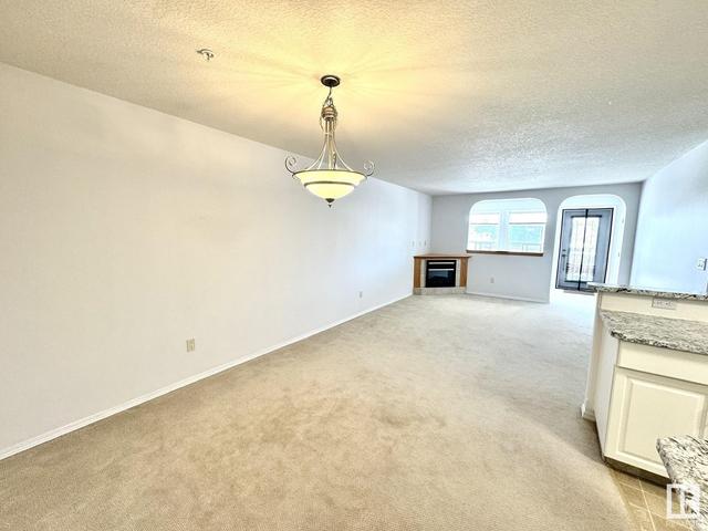 206 - 4604 48a St, Condo with 2 bedrooms, 1 bathrooms and null parking in Leduc AB | Image 21