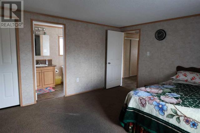 720 2 Street N, House other with 3 bedrooms, 2 bathrooms and 4 parking in Taber MD AB | Image 16