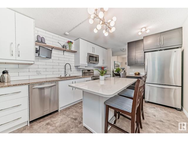 147 Knottwood Rd N Nw, House attached with 2 bedrooms, 2 bathrooms and null parking in Edmonton AB | Image 1