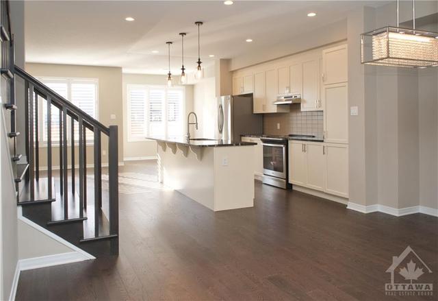323 Nonius Street, Townhouse with 3 bedrooms, 3 bathrooms and 3 parking in Ottawa ON | Image 5