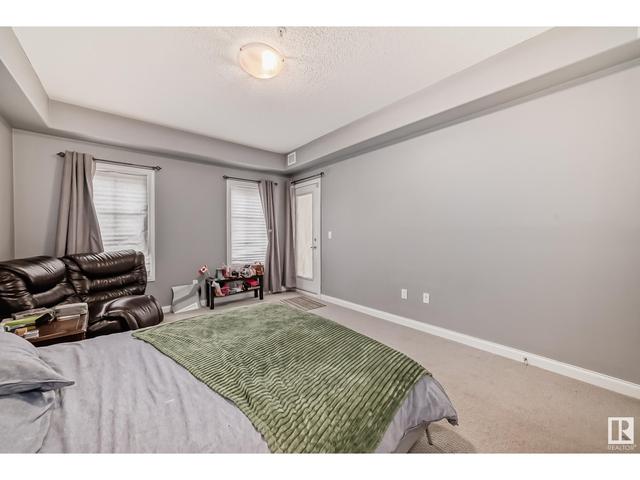 101 - 1406 Hodgson Wy Nw, Condo with 2 bedrooms, 2 bathrooms and 2 parking in Edmonton AB | Image 23