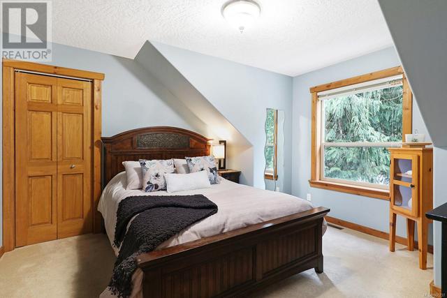 7754 Vivian Way, House detached with 3 bedrooms, 3 bathrooms and 4 parking in Comox Valley A BC | Image 17