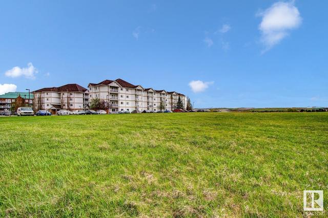 306 - 9930 100 Av, Condo with 2 bedrooms, 2 bathrooms and 1 parking in Fort Saskatchewan AB | Image 34