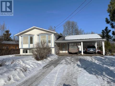 1250 Dogwood Street, House detached with 4 bedrooms, 3 bathrooms and null parking in Telkwa BC | Card Image