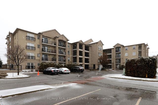 409 - 1380 Main St E, Condo with 2 bedrooms, 1 bathrooms and 4 parking in Milton ON | Image 1
