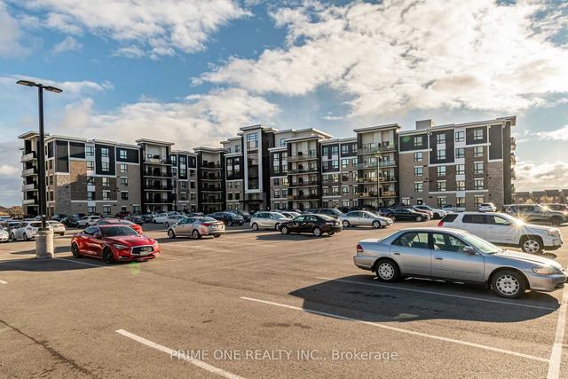 319 - 640 Sauve St, Condo with 2 bedrooms, 2 bathrooms and 1 parking in Milton ON | Image 1
