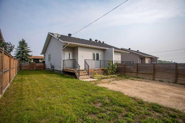 5697 45 Avenue, Home with 3 bedrooms, 2 bathrooms and 2 parking in Lacombe AB | Image 19