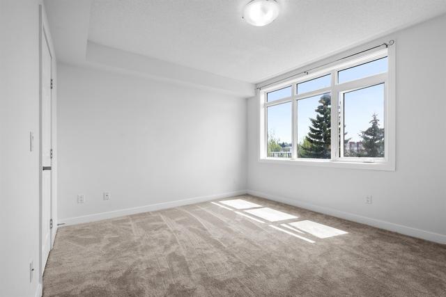 401 - 2419 Centre Street Nw, Condo with 2 bedrooms, 2 bathrooms and 1 parking in Calgary AB | Image 15
