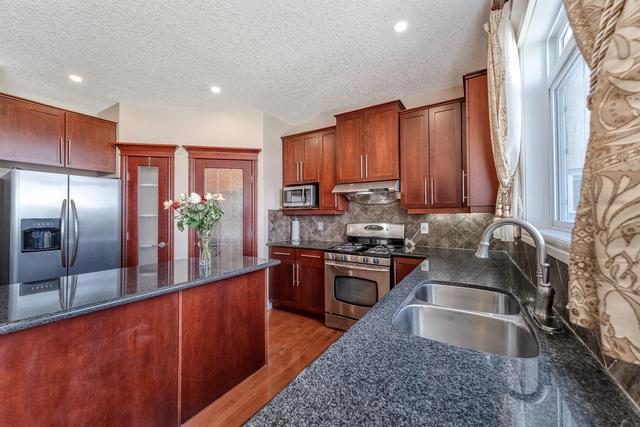 32 Panatella Manor Nw, House detached with 5 bedrooms, 4 bathrooms and 2 parking in Calgary AB | Image 7