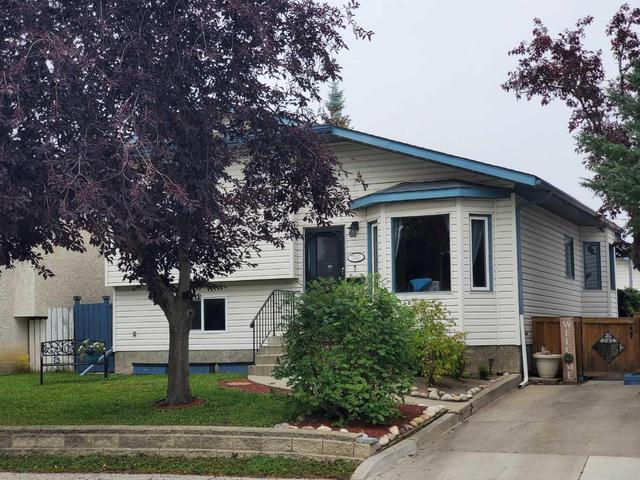 7043 Poplar Drive, House detached with 3 bedrooms, 2 bathrooms and 3 parking in Grande Prairie AB | Image 1